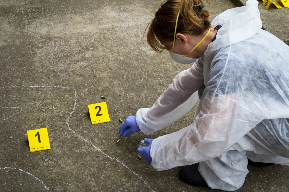 Woman cleaning up crime scene